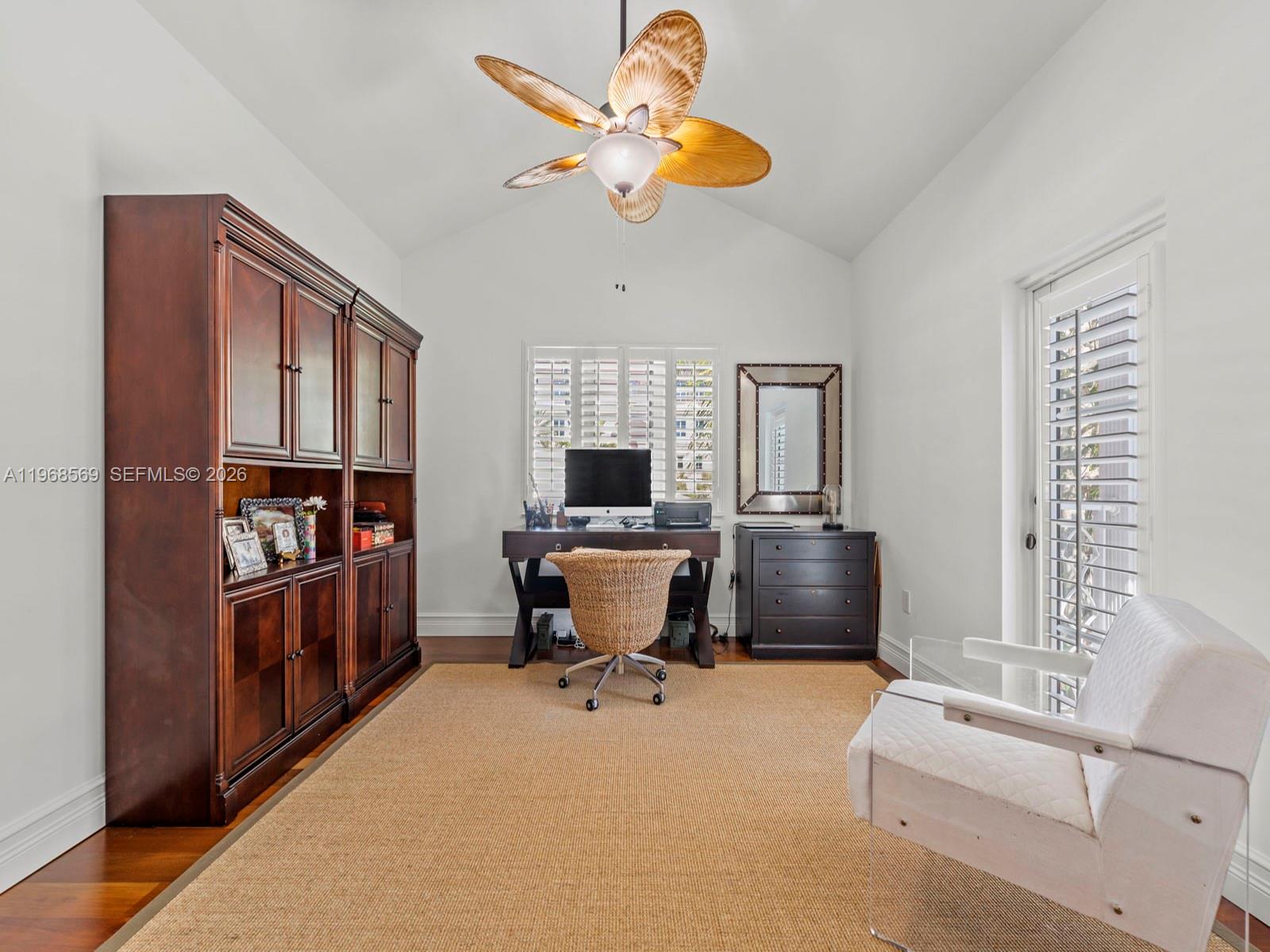 7218 Southwest 54th Court Miami, FL 33143 - Photo 29 of 47 a living room with furniture and a window