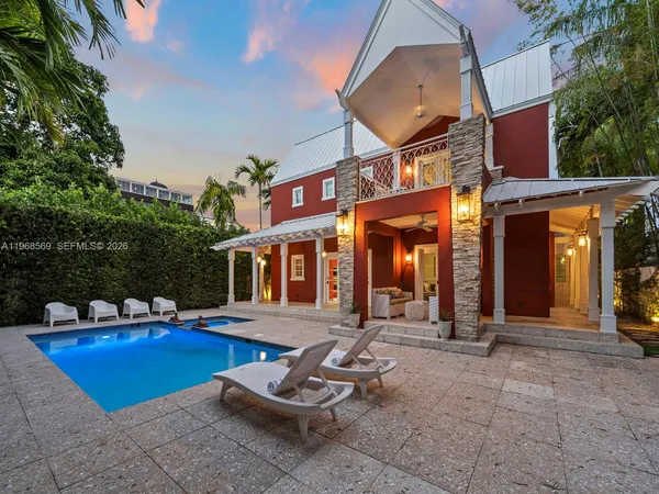 a view of a house with backyard porch and patio