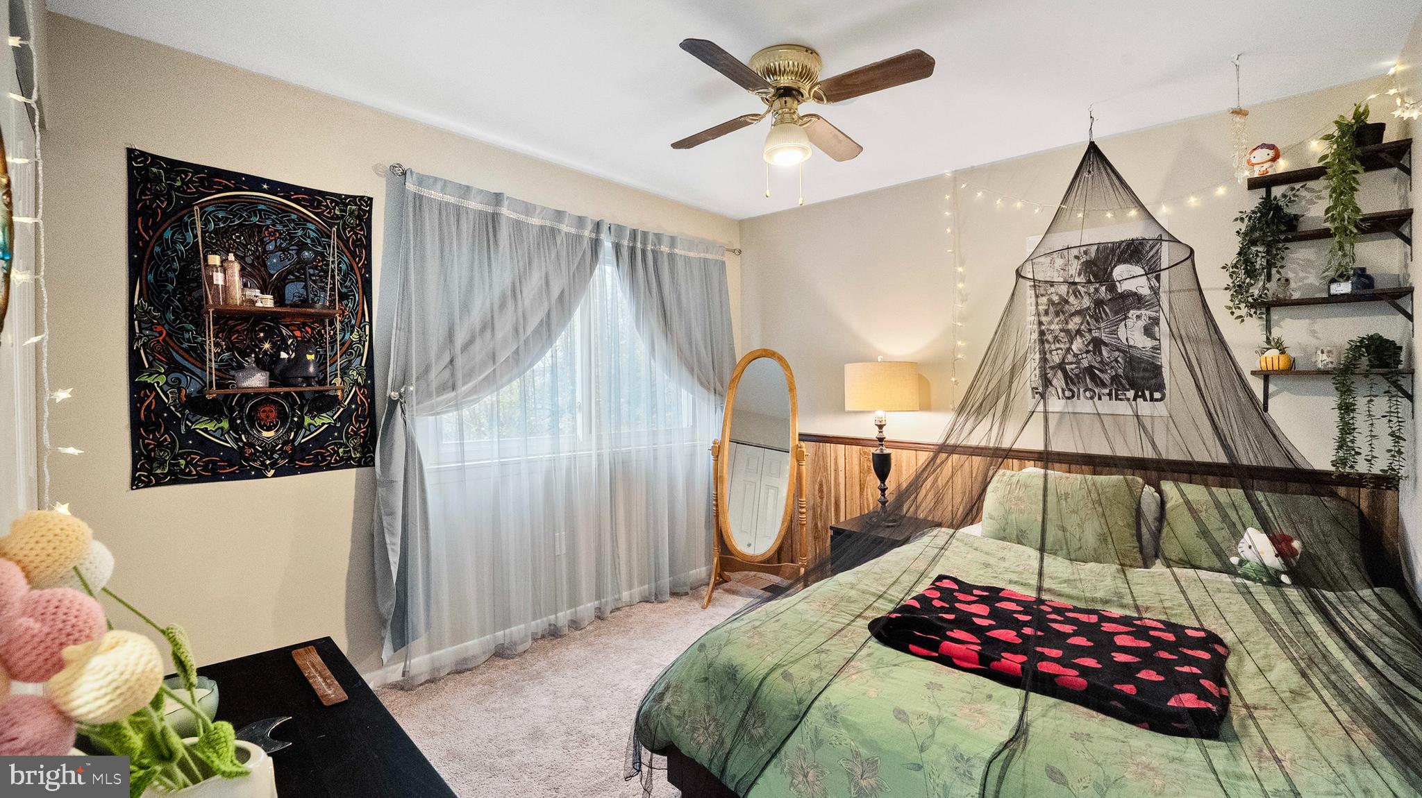 12862 Sage Terrace Germantown, MD 20874 - Photo 11 of 25 a bedroom with a bed and a chandelier