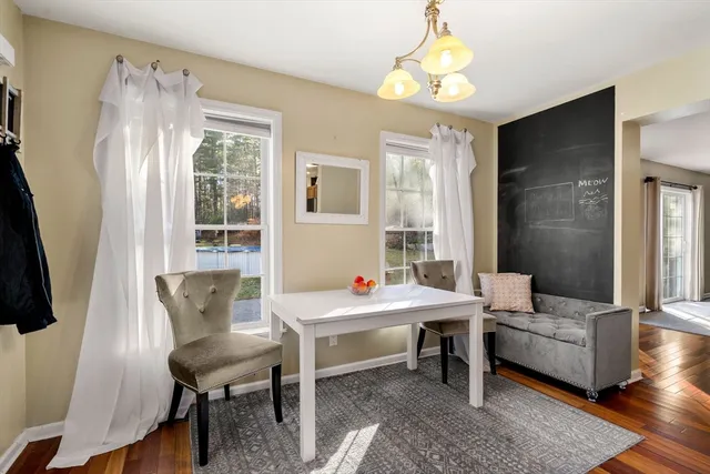 a room with furniture and a window