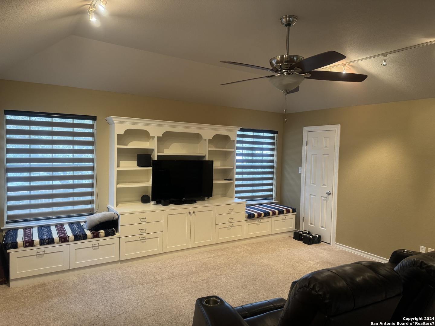 3 Lindquist San Antonio, TX 78248 - Photo 14 of 35 a bedroom with a bed dresser and a flat screen tv