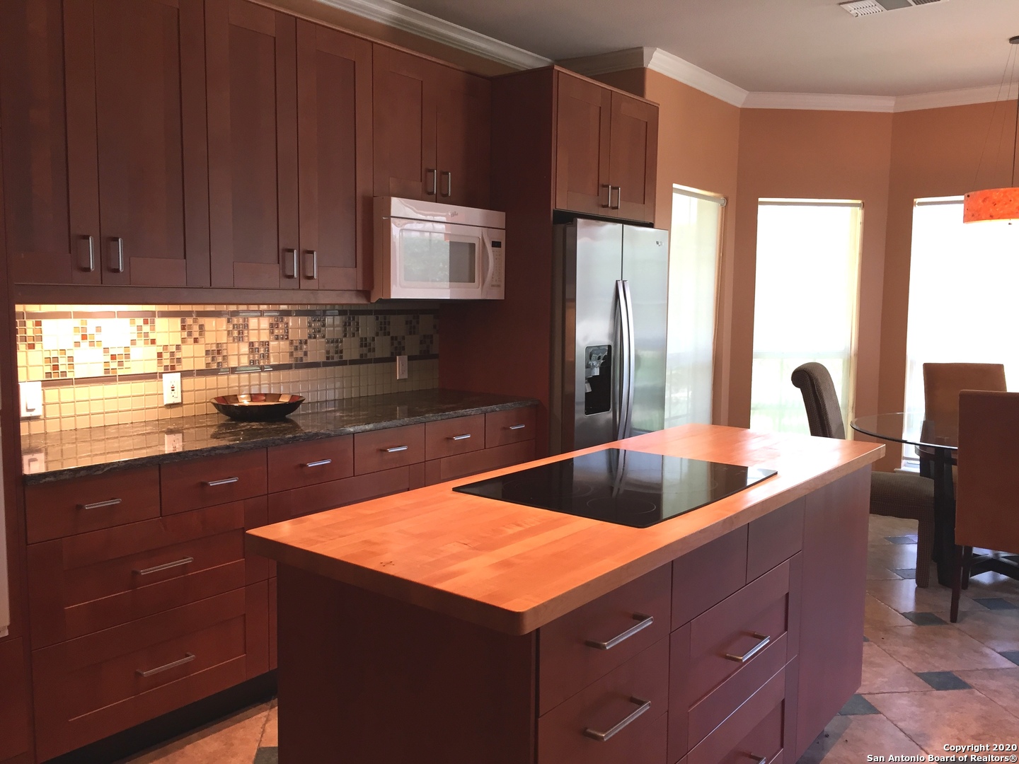3 Lindquist San Antonio, TX 78248 - Photo 19 of 35 a kitchen with a sink cabinets and black stainless steel appliances