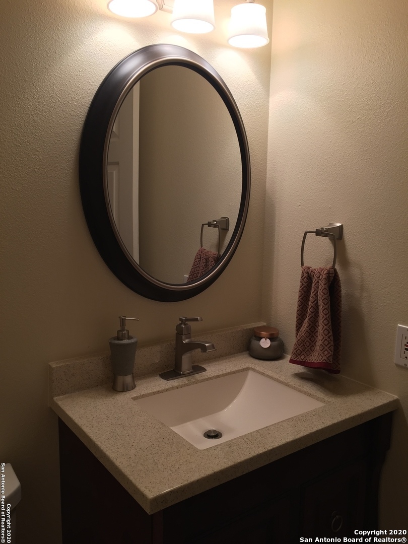 3 Lindquist San Antonio, TX 78248 - Photo 20 of 35 a bathroom with a sink and a mirror