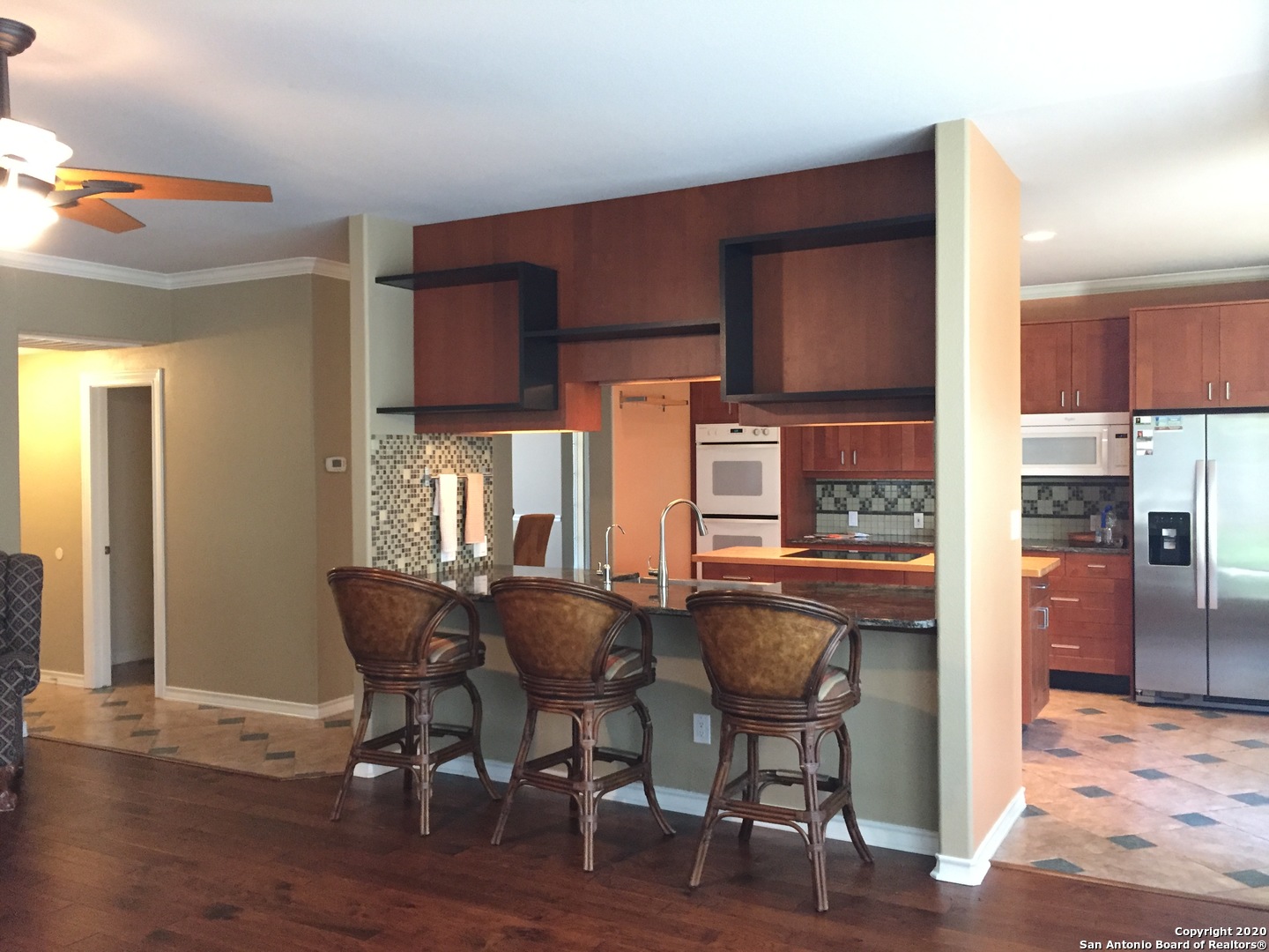 3 Lindquist San Antonio, TX 78248 - Photo 2 of 35 a view of a dining room with furniture and wooden floor