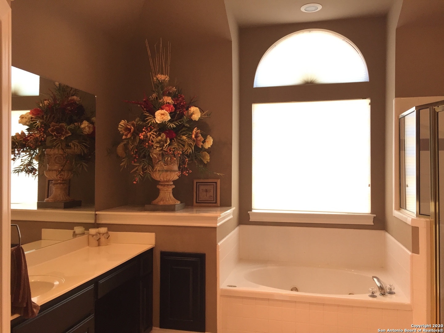 3 Lindquist San Antonio, TX 78248 - Photo 23 of 35 a bathroom with a tub sink and mirror