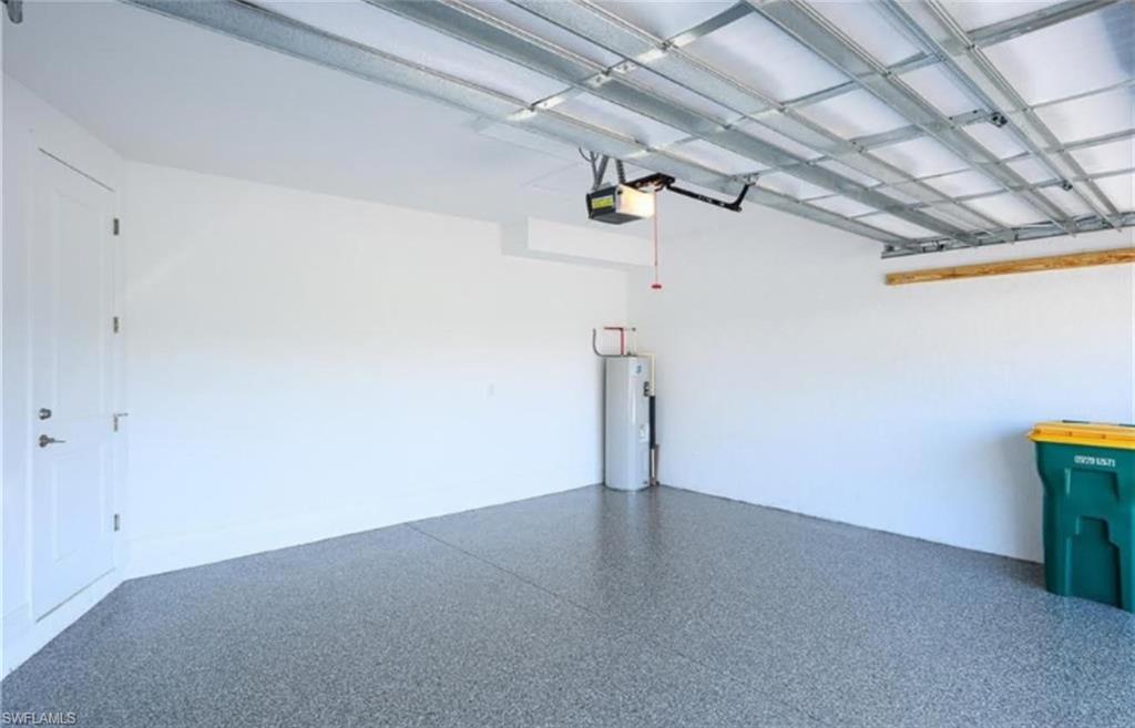 7622 Rockefeller Drive Naples, FL 34119 - Photo 27 of 35 a view of a room with racks on the wall