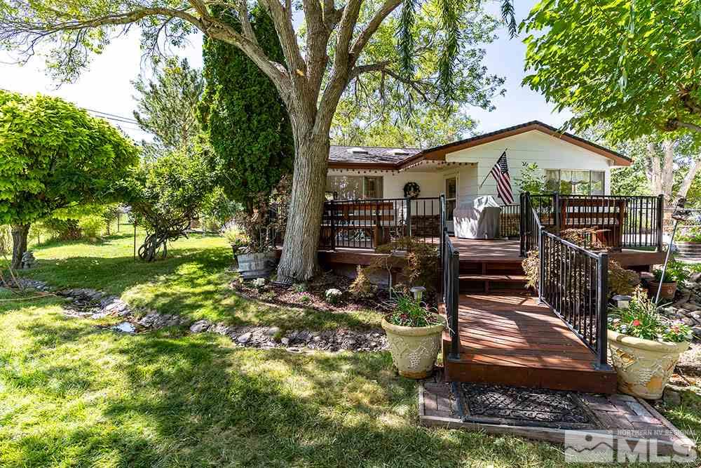 11325 Maverick Lane Reno, NV 89511 - Photo 1 of 20 a front view of house with yard