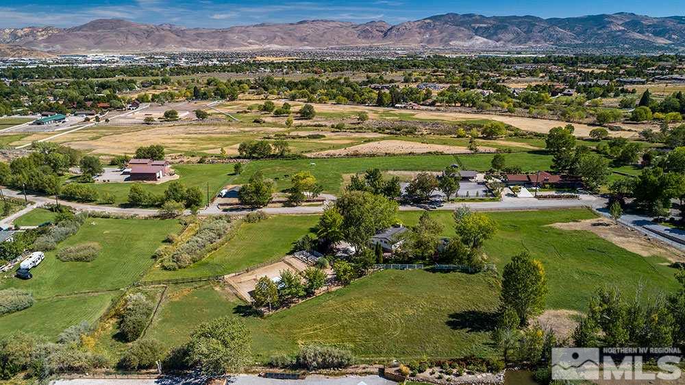 11325 Maverick Lane Reno, NV 89511 - Photo 14 of 20 an aerial view of residential houses with outdoor space and river
