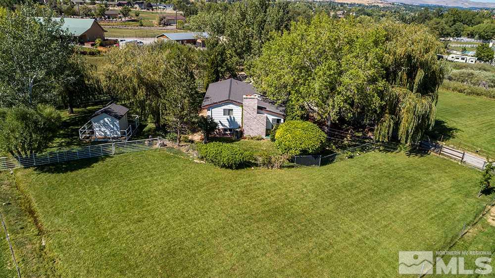 11325 Maverick Lane Reno, NV 89511 - Photo 18 of 20 a picture of a house with a garden