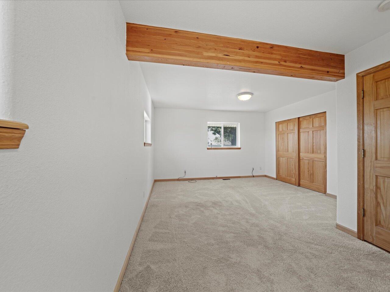 55 Valley View Road Ridgway, CO 81432 - Photo 27 of 39 an empty room with windows