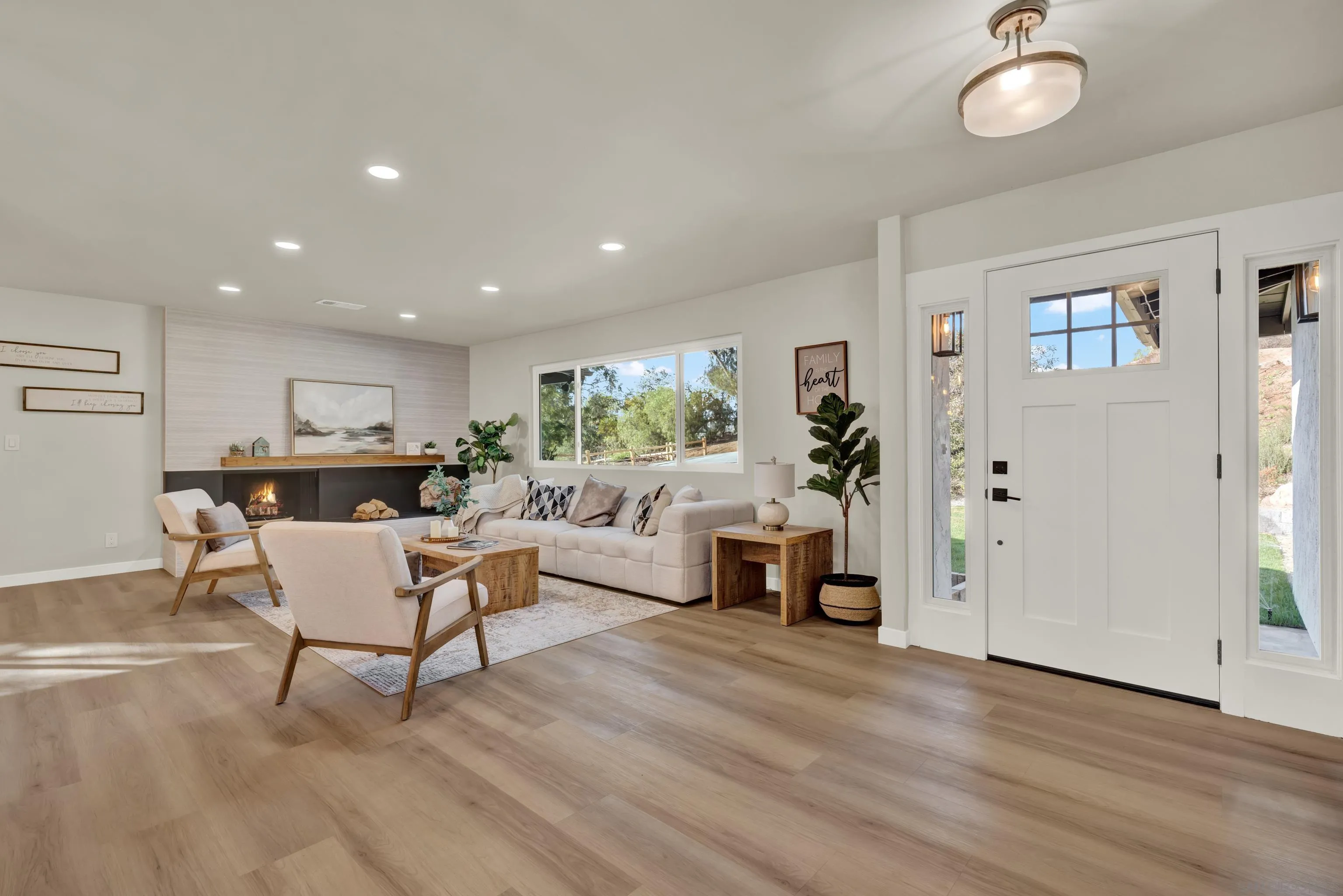 14407 Mountain Road Poway, CA 92064 - Photo 11 of 75 a living room with furniture and a fireplace