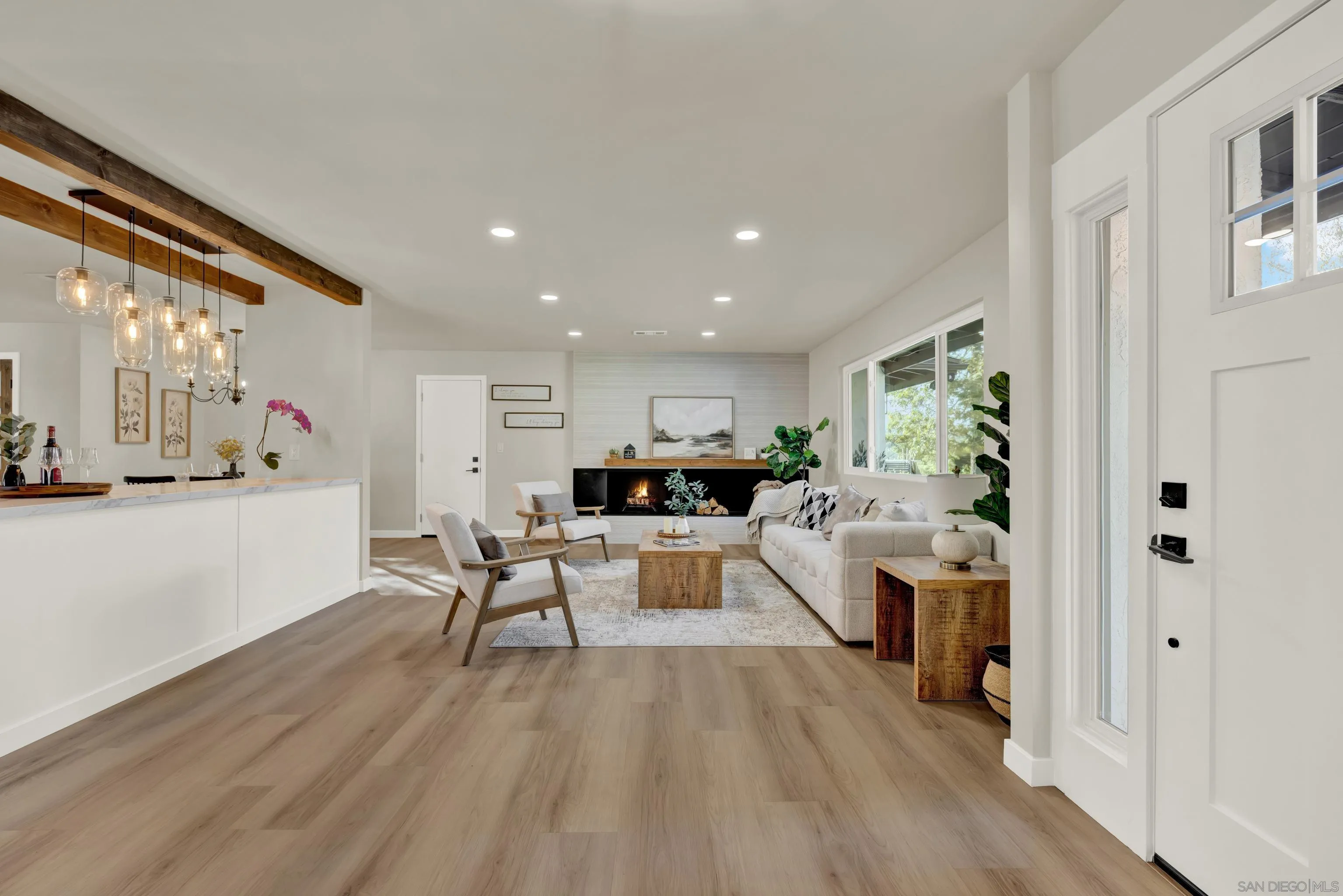 14407 Mountain Road Poway, CA 92064 - Photo 12 of 75 a living room with furniture and a large window