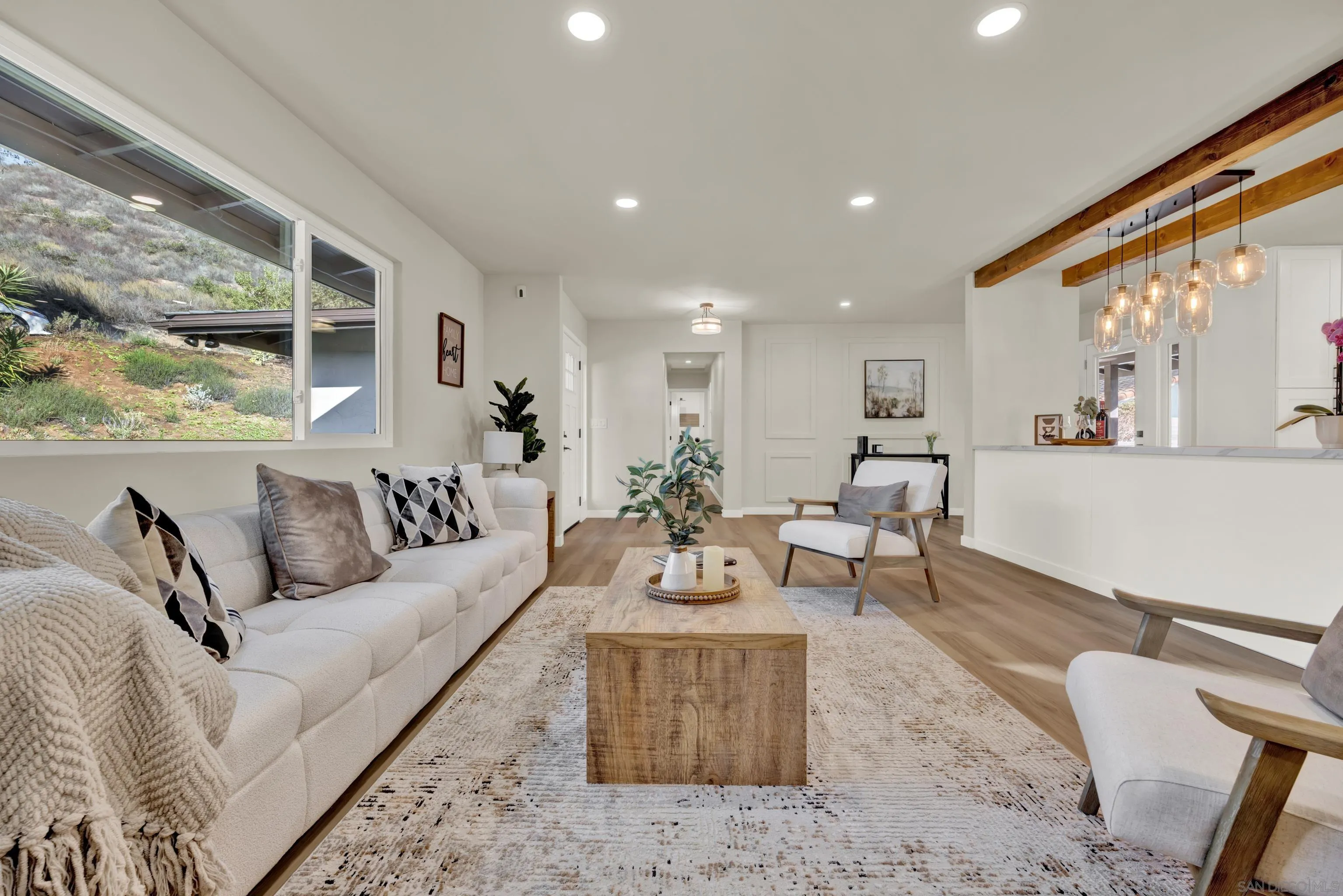 14407 Mountain Road Poway, CA 92064 - Photo 14 of 75 a living room with furniture and a large window