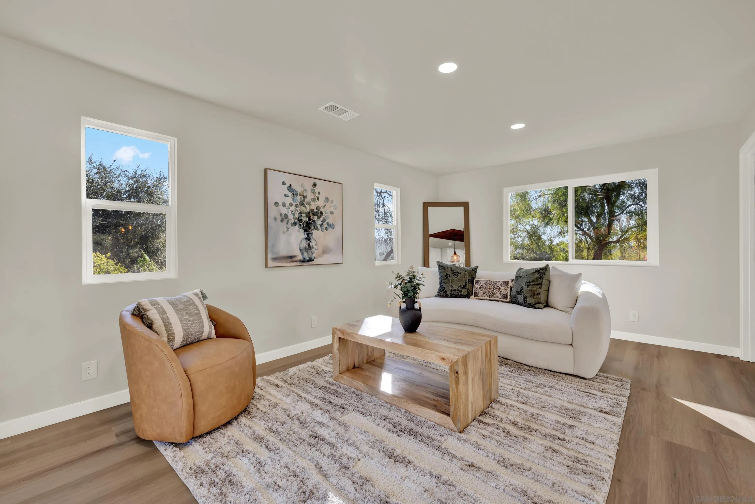14407 Mountain Road Poway, CA 92064 - Photo 25 of 75 a living room with furniture and a couch