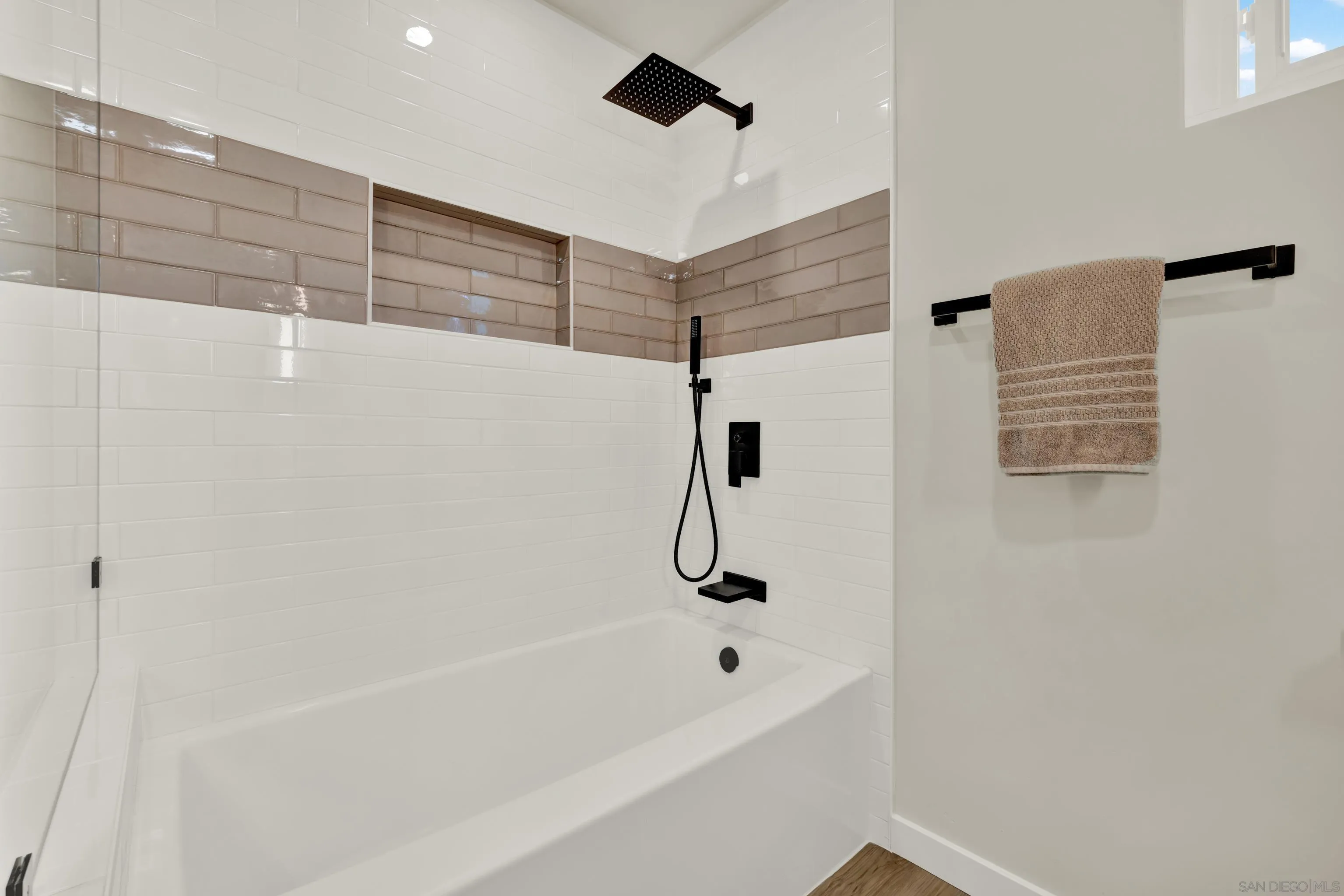 14407 Mountain Road Poway, CA 92064 - Photo 50 of 75 a bathroom with a bathtub and shower