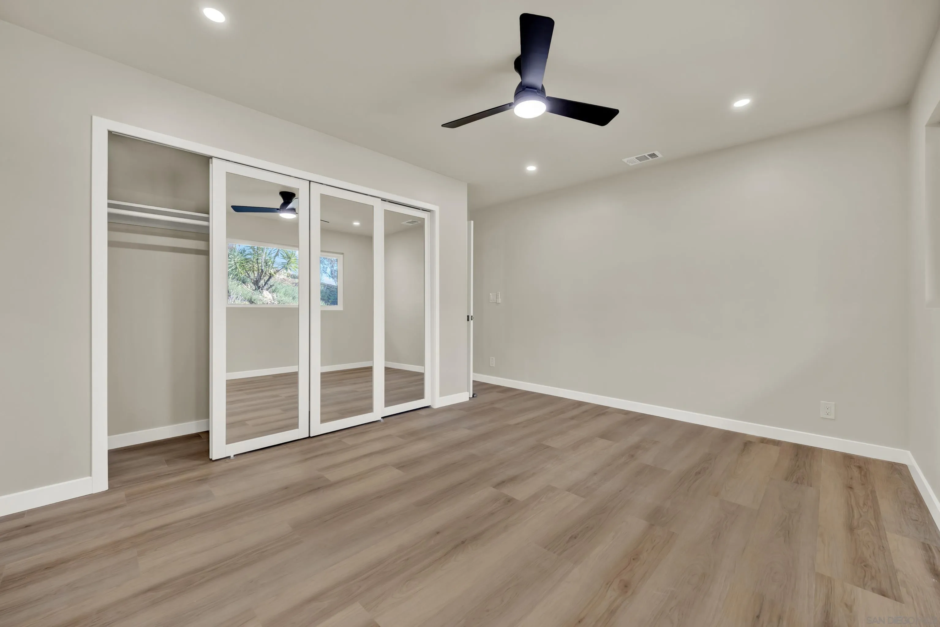 14407 Mountain Road Poway, CA 92064 - Photo 54 of 75 wooden floor in an empty room with a window