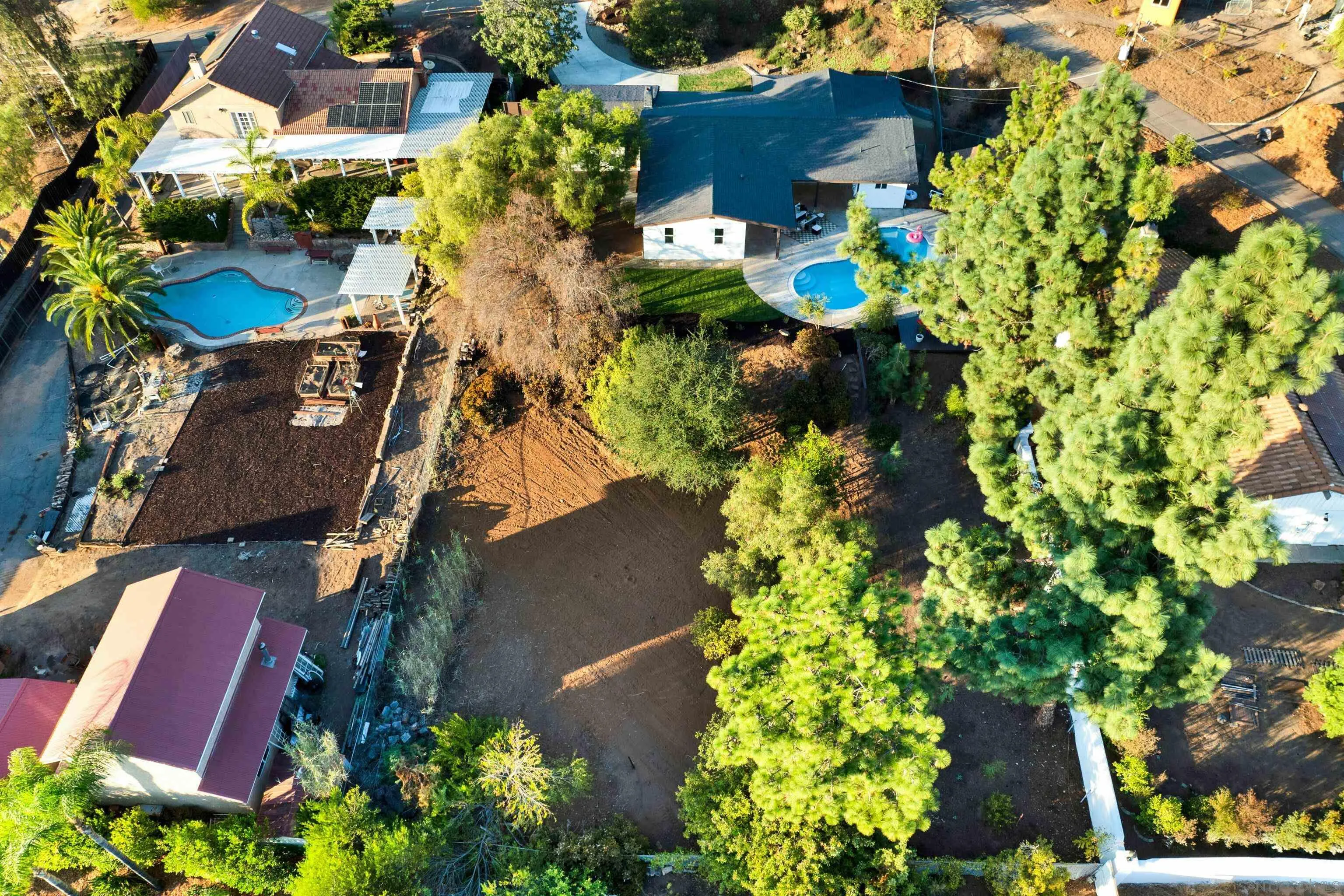 14407 Mountain Road Poway, CA 92064 - Photo 55 of 75 an aerial view of a house with a yard and garden