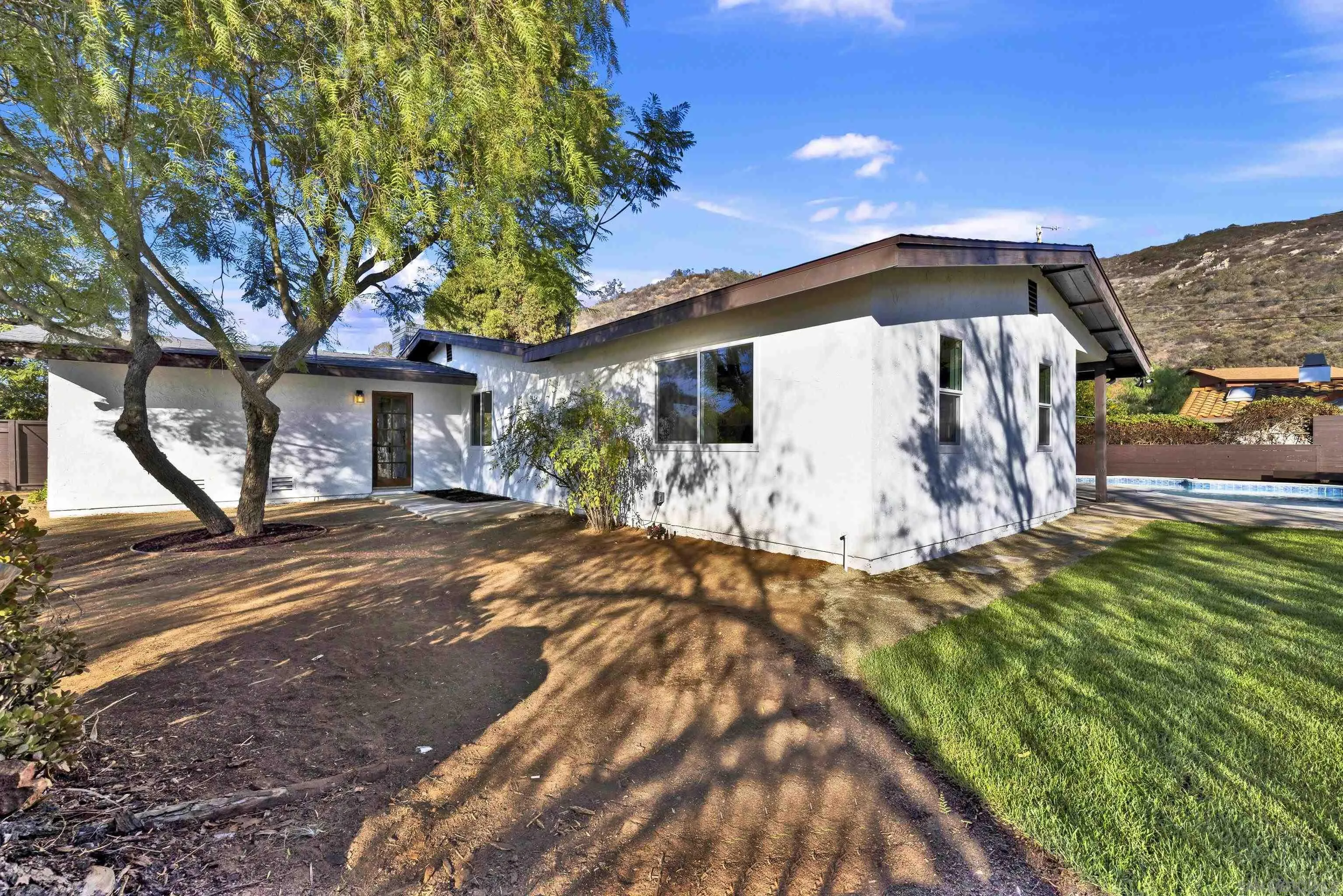 14407 Mountain Road Poway, CA 92064 - Photo 63 of 75 a view of a house with a yard