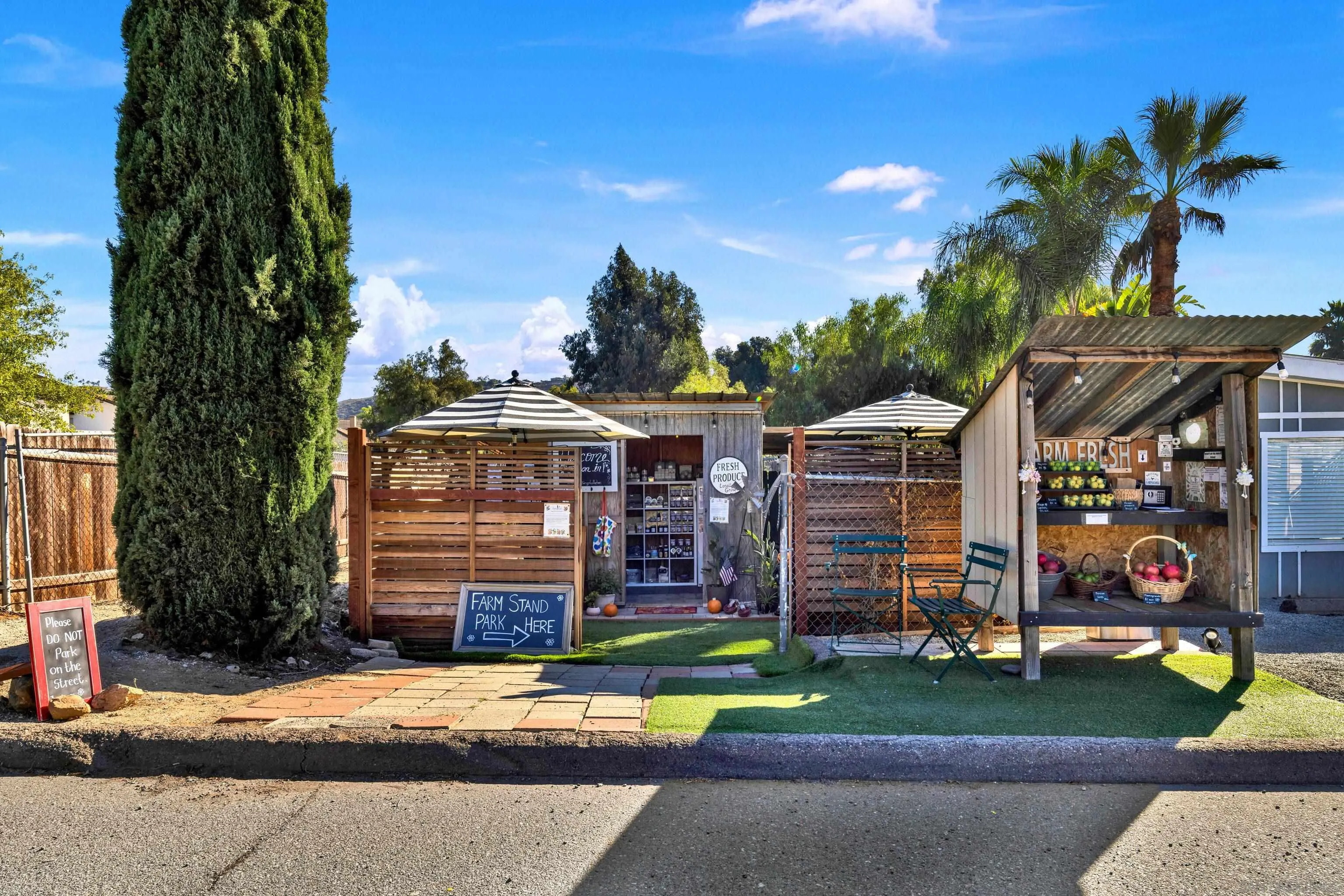 14407 Mountain Road Poway, CA 92064 - Photo 71 of 75 a front view of a house with garden and plants