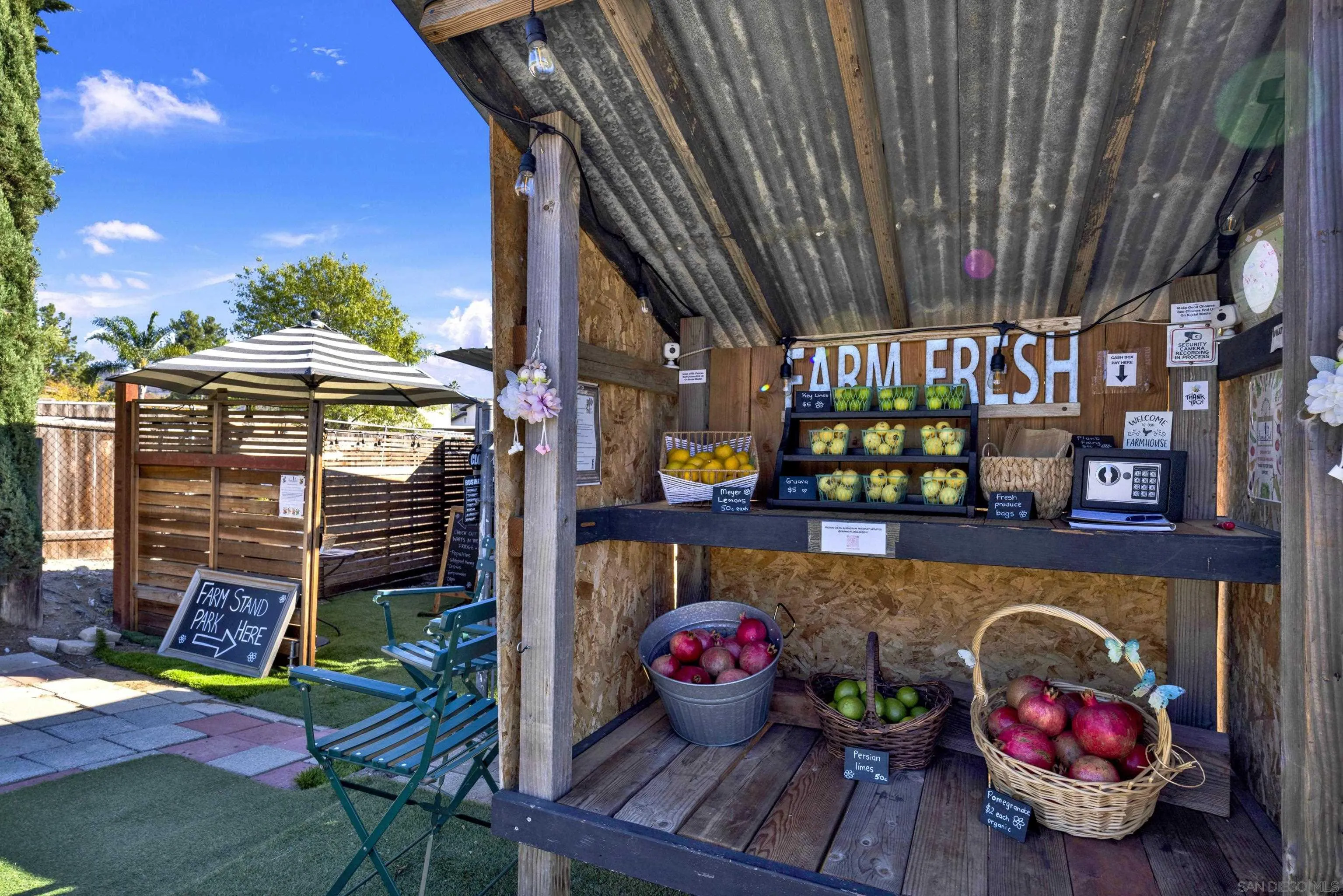 14407 Mountain Road Poway, CA 92064 - Photo 72 of 75 a view of a chairs and tables in patio