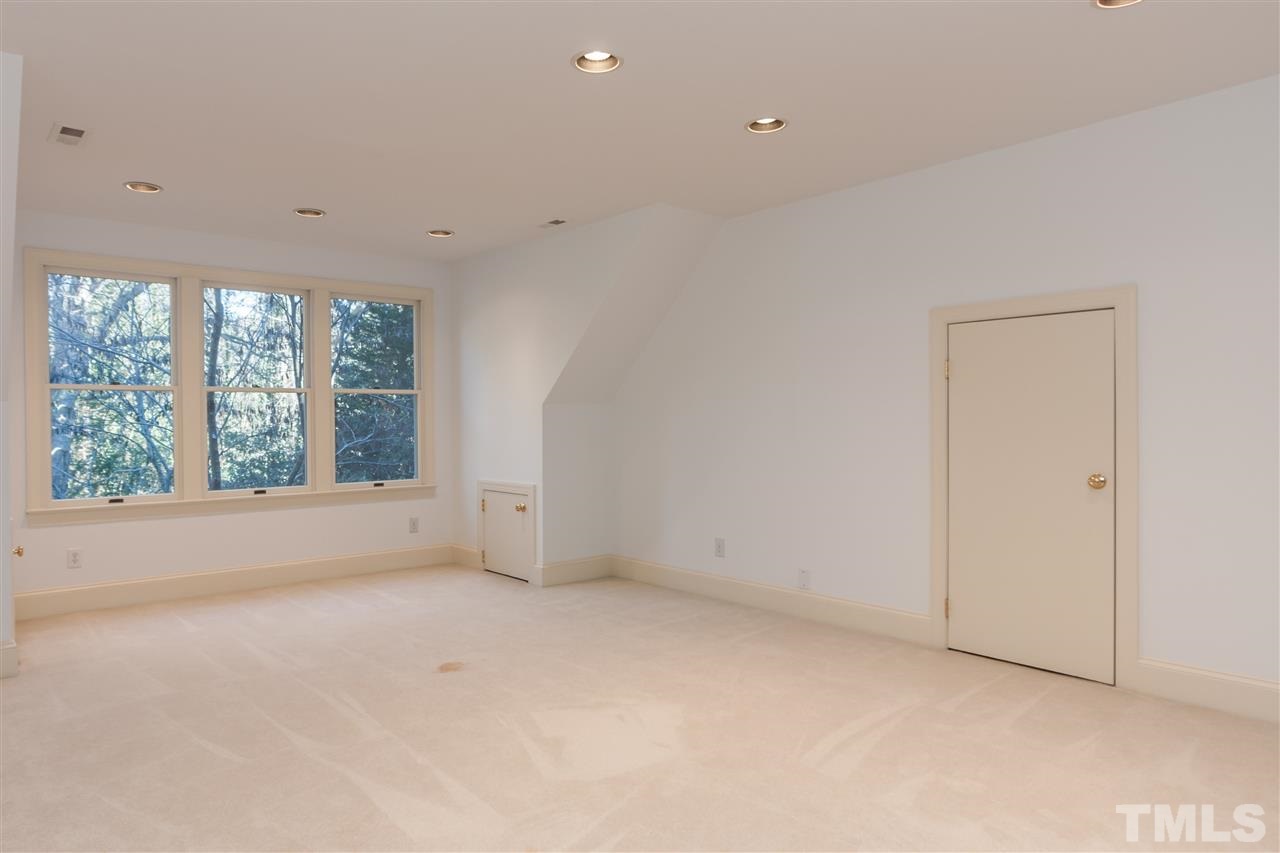 2008 Tradd Court Raleigh, NC 27607 - Photo 16 of 25 a view of an empty room with a window