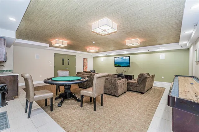 a living room with furniture and a table