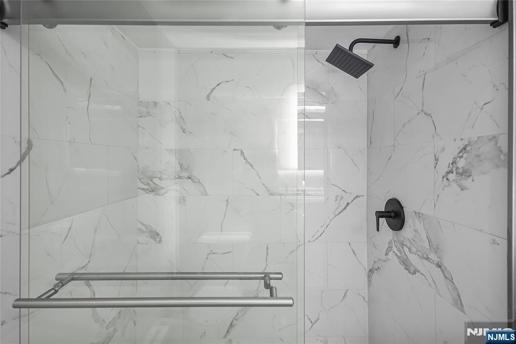 75 West Columbia Avenue, Unit 2 Palisades Park, NJ 07650 - Photo 13 of 27 a bathroom with a shower