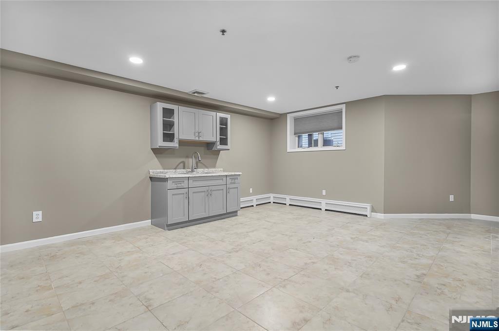 75 West Columbia Avenue, Unit 2 Palisades Park, NJ 07650 - Photo 19 of 27 a view of a kitchen with a sink and dishwasher