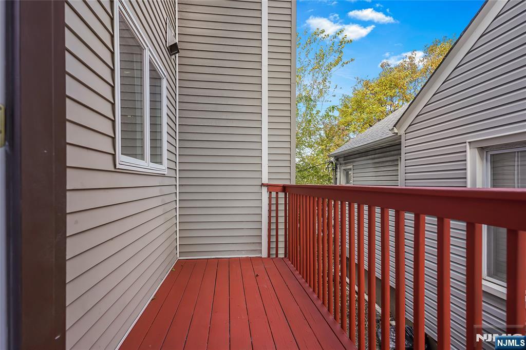75 West Columbia Avenue, Unit 2 Palisades Park, NJ 07650 - Photo 7 of 27 a view of a wooden balcony