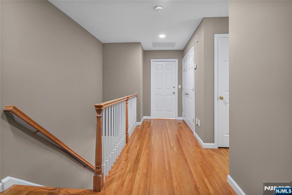 75 West Columbia Avenue, Unit 2 Palisades Park, NJ 07650 - Photo 8 of 27 a view of hallway with wooden floor
