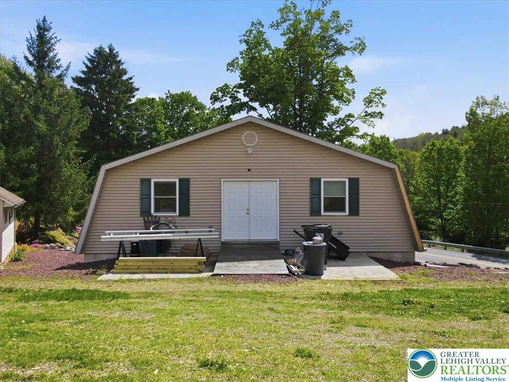 4880 Little Gap Road Kunkletown, PA 18058 - Photo 82 of 100 This gambrel-style home offers rustic charm with a large front yard and ample outdoor space.