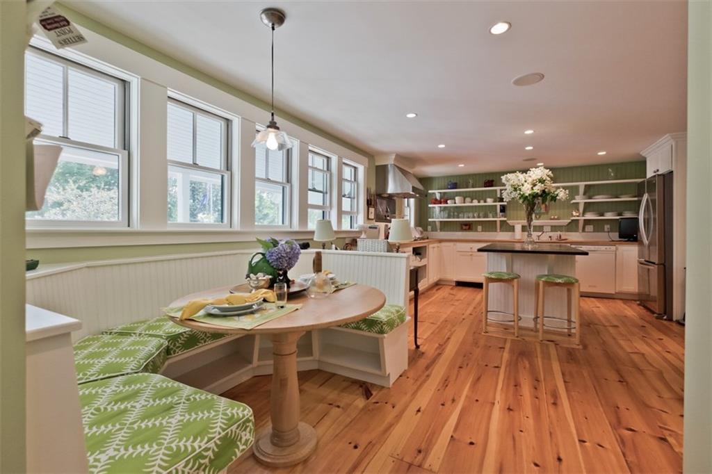 1097 Main Street Lovell, ME 04051 - Photo 10 of 34 The ktichen is open with a breakfast...