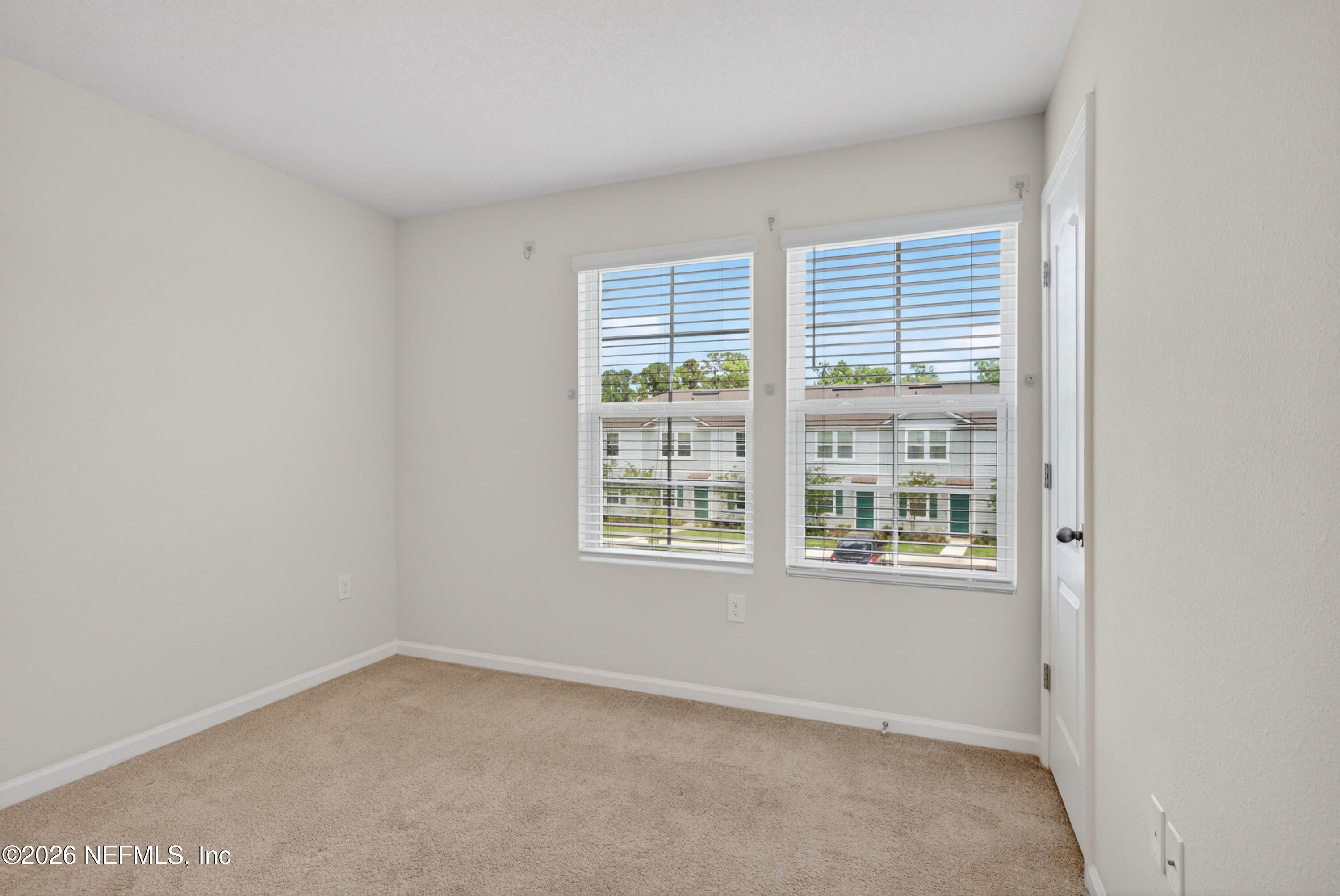 8210 Larose Road Jacksonville, FL 32211 - Photo 18 of 38 an empty room with a window
