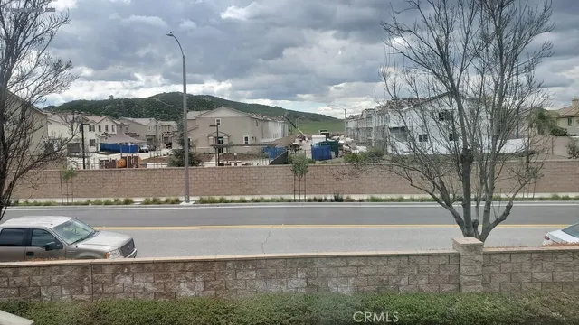 a view of a water fountain in front of a building