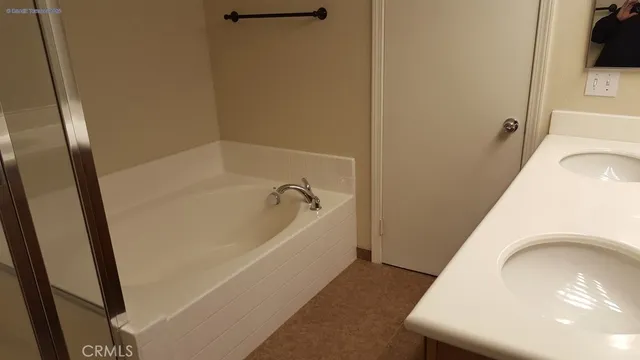 a bathroom with a sink and a bathtub