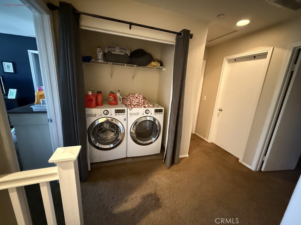 31771 Biagio Way Winchester, CA 92596 - Photo 27 of 44 a utility room with dryer and washer