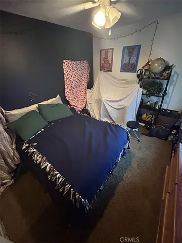 a view of an empty room with empty shelves