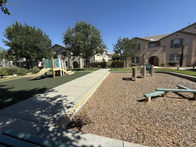 a view of a swimming pool with a lounge chairs