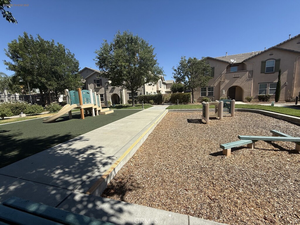 31771 Biagio Way Winchester, CA 92596 - Photo 37 of 44 a front view of a house with a yard