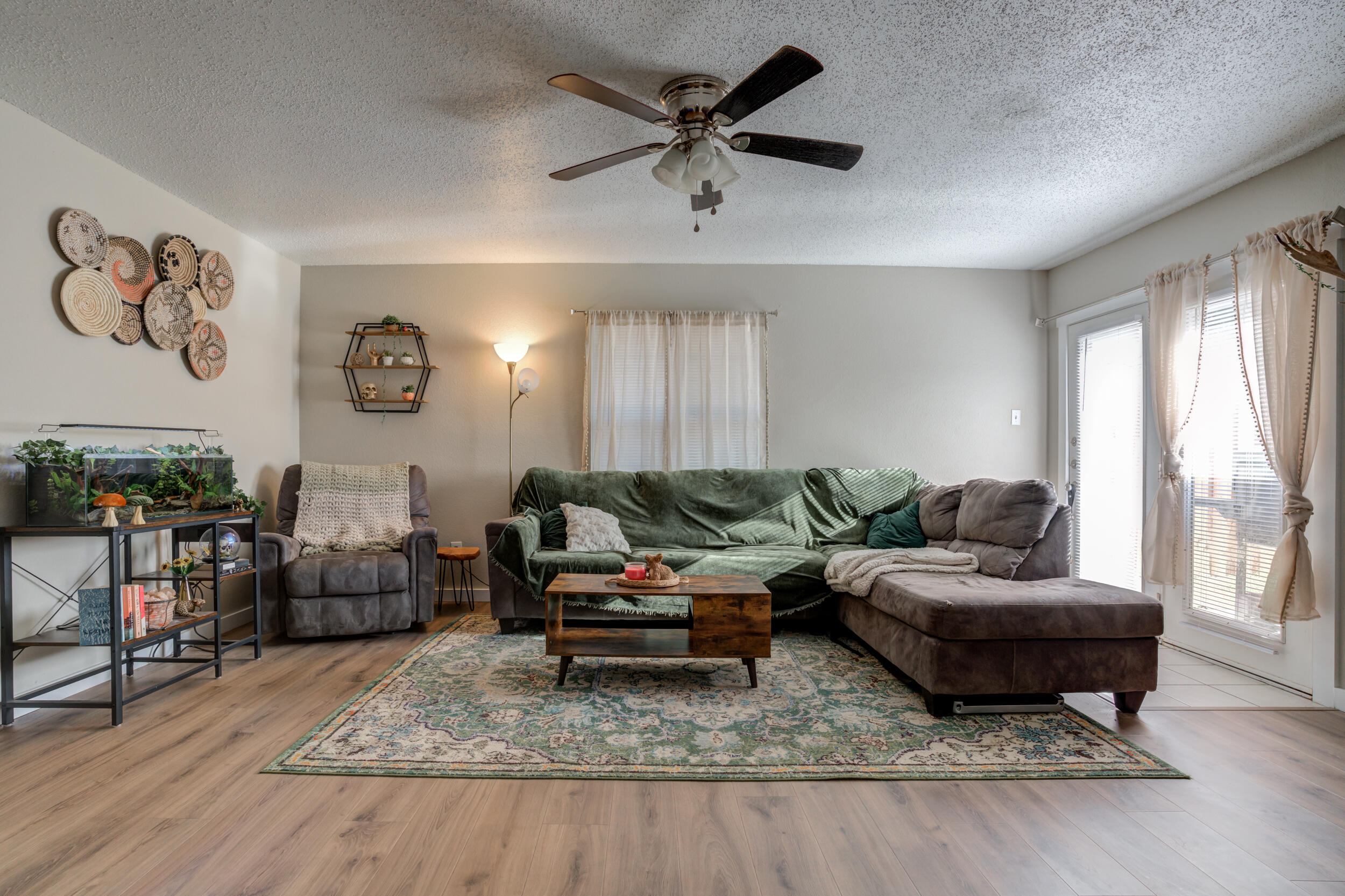 8406 Canton Avenue Lubbock, TX 79423 - Photo 11 of 25 a living room with furniture and a couch
