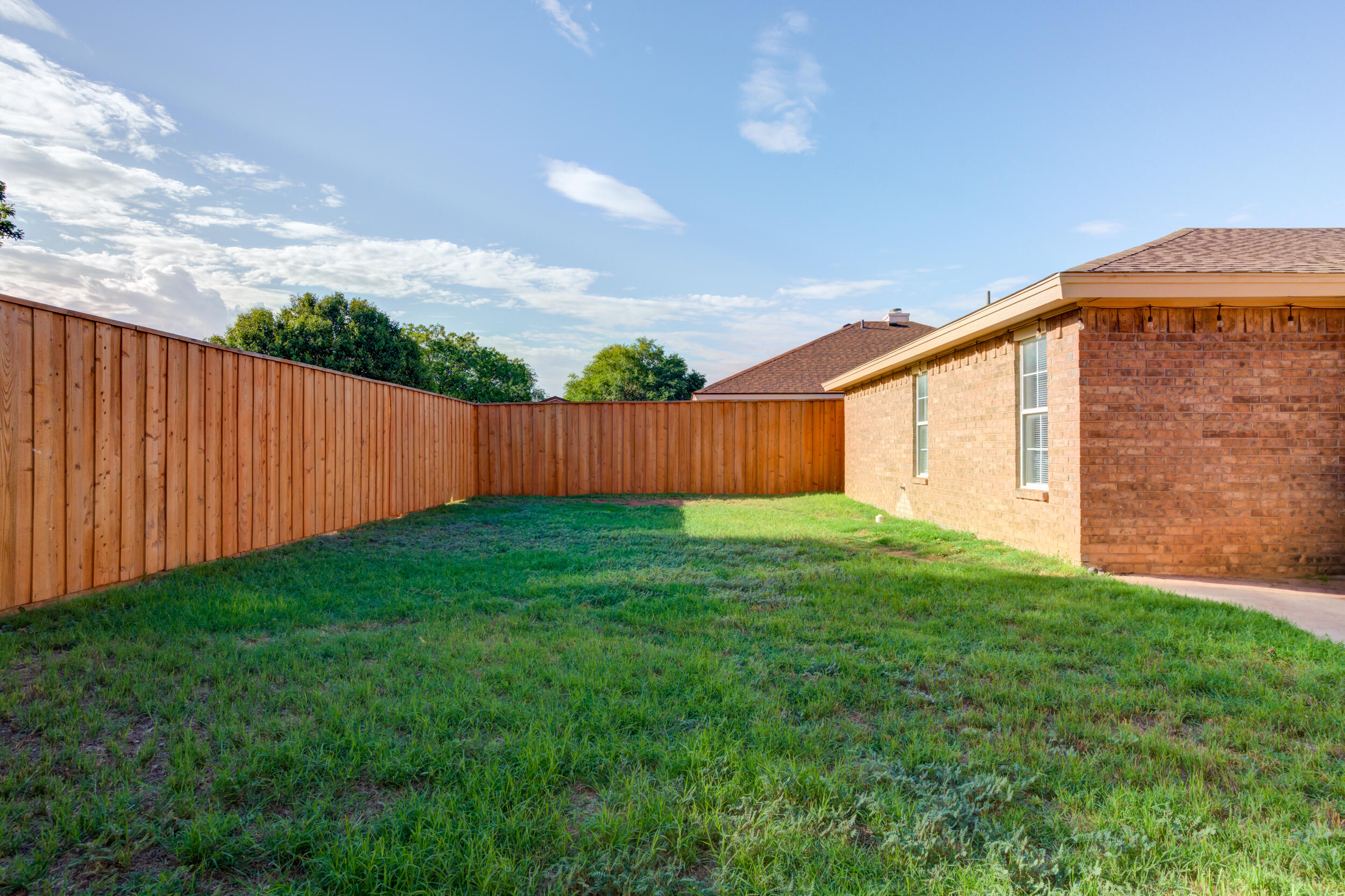8406 Canton Avenue Lubbock, TX 79423 - Photo 20 of 25 a view of a backyard