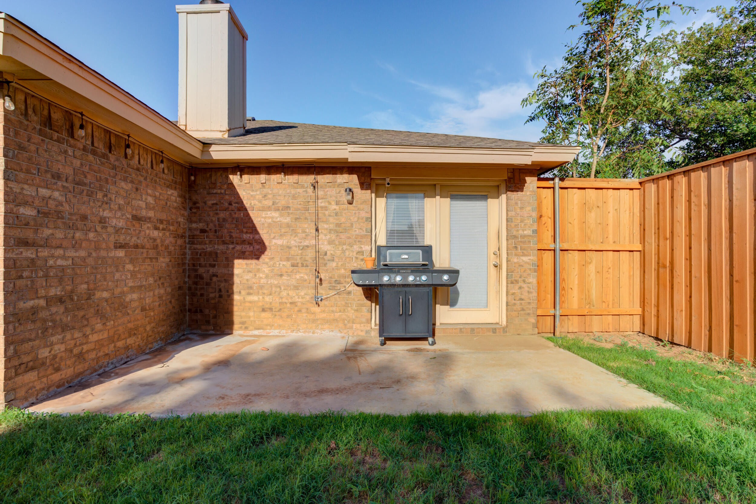 8406 Canton Avenue Lubbock, TX 79423 - Photo 23 of 25 a view of backyard of house with green space