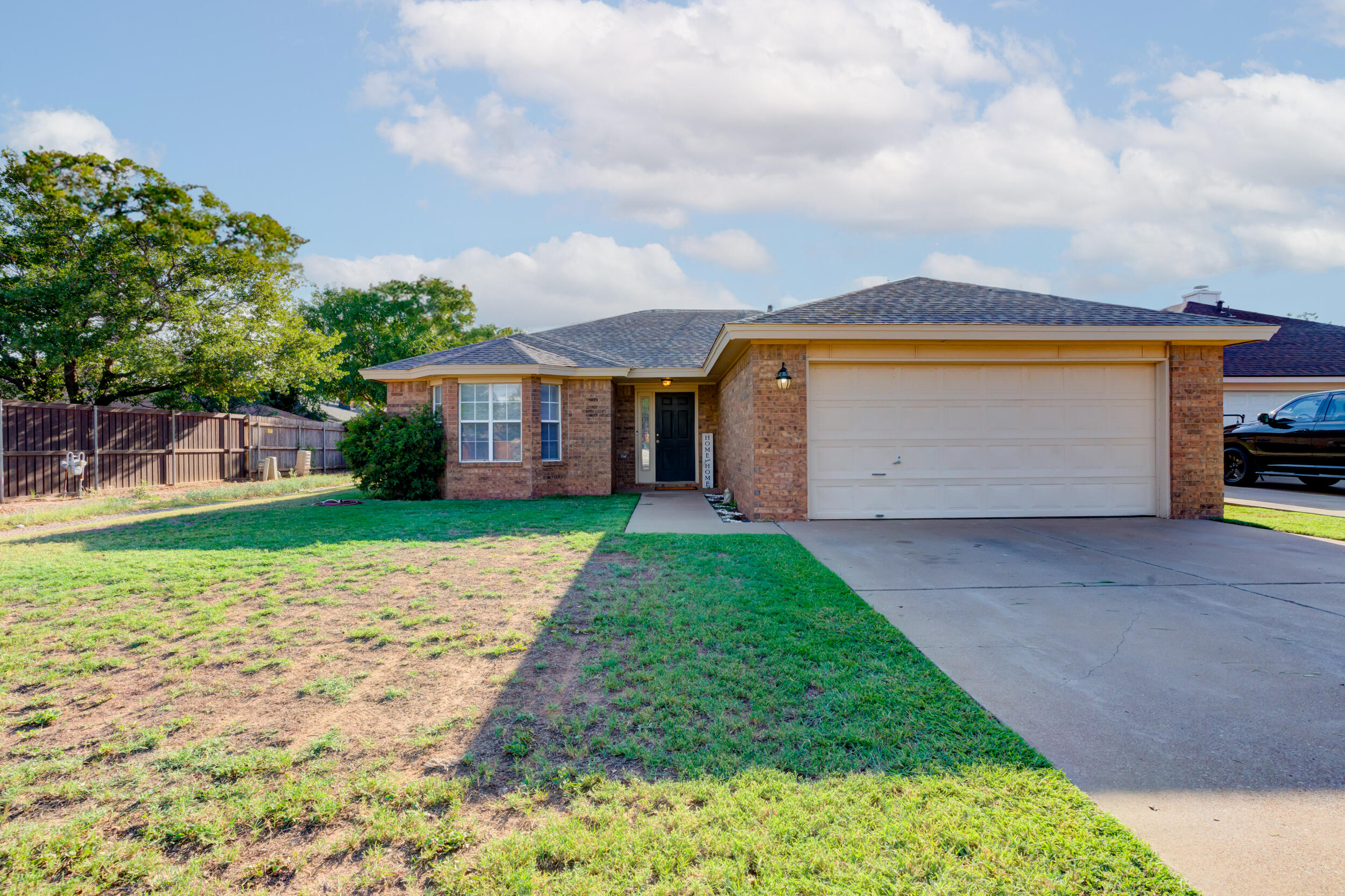 8406 Canton Avenue Lubbock, TX 79423 - Photo 25 of 25 a front view of house with yard