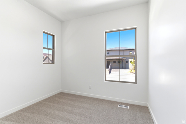 7243 West Terraine Road West Jordan, UT 84081 - Photo 18 of 31 Neutral wall finishes and light-colored carpeting