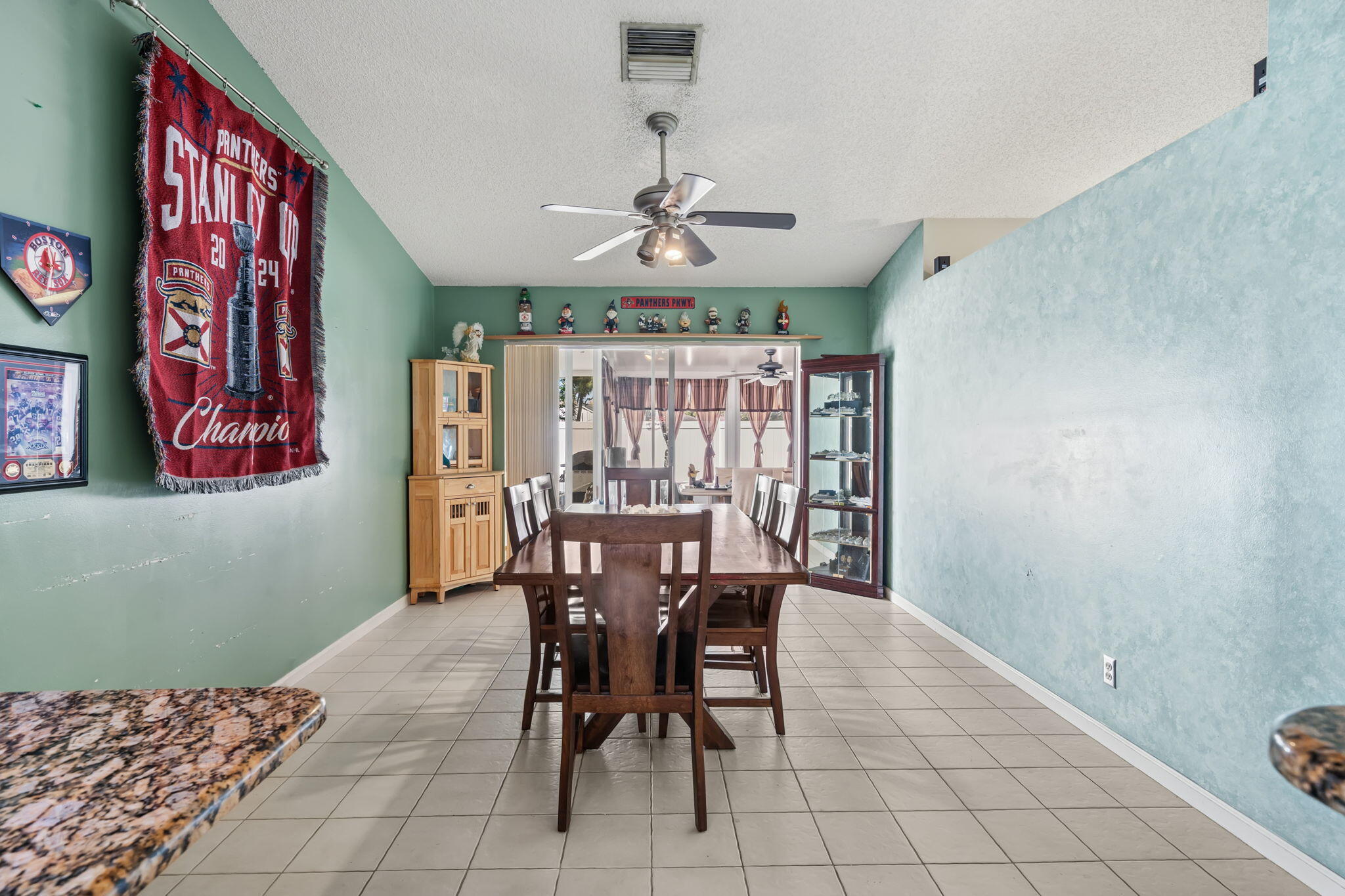 5197 Rosen Boulevard Boynton Beach, FL 33472 - Photo 13 of 35 Dining room with Patio Access