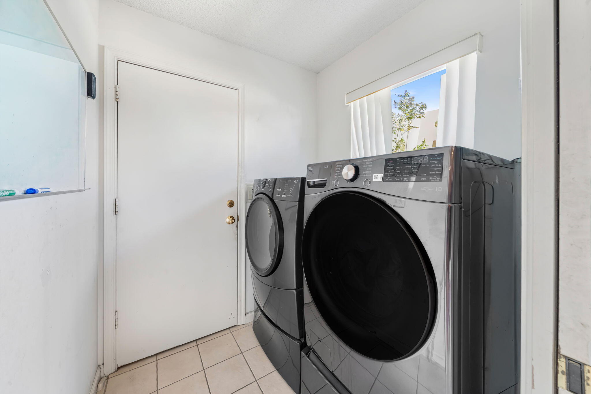 5197 Rosen Boulevard Boynton Beach, FL 33472 - Photo 26 of 35 Inside Laundry