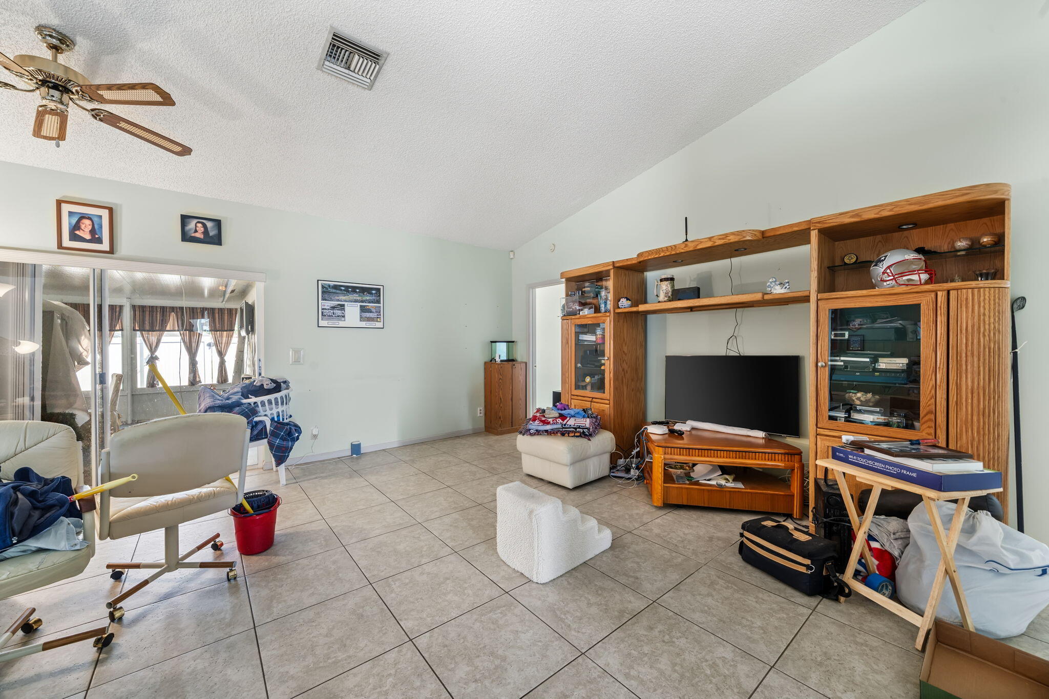 5197 Rosen Boulevard Boynton Beach, FL 33472 - Photo 6 of 35 Living room with Patio Access