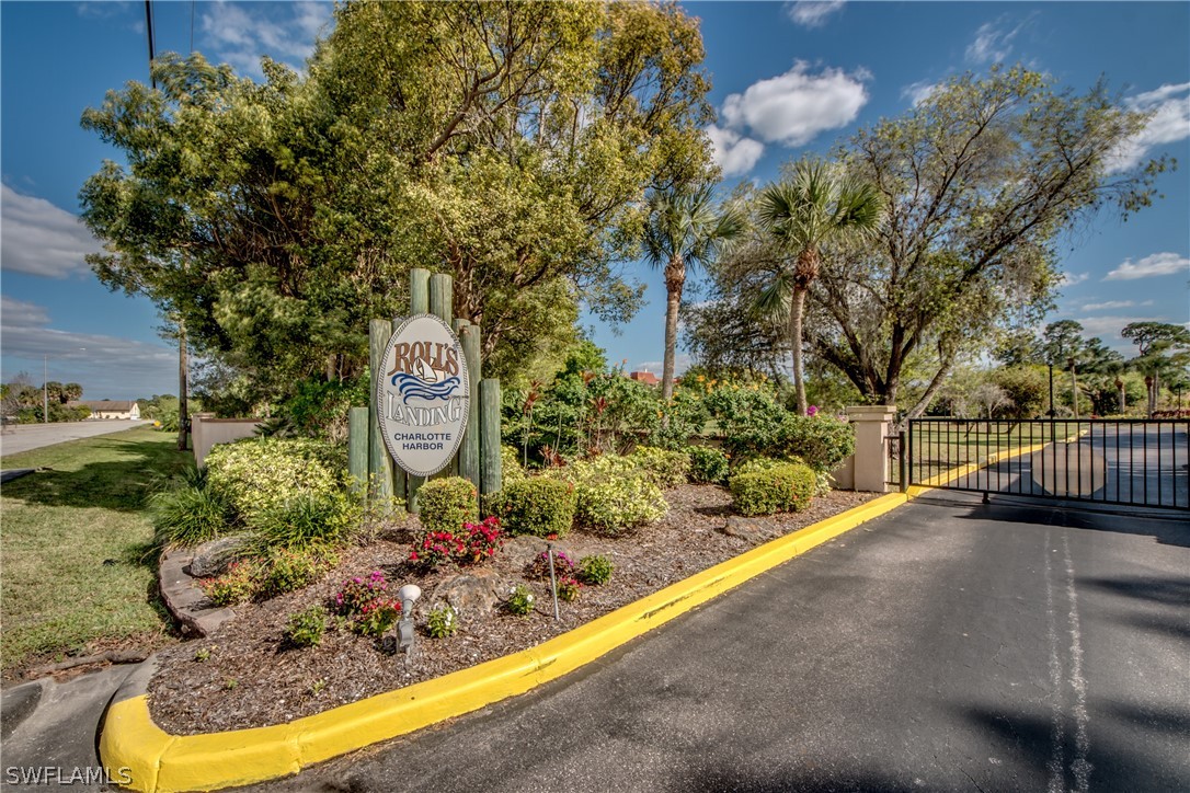 23465 Harbor View Road, Unit 1008 Port Charlotte, FL 33980 - Photo 22 of 33 a view of a street with potted plants