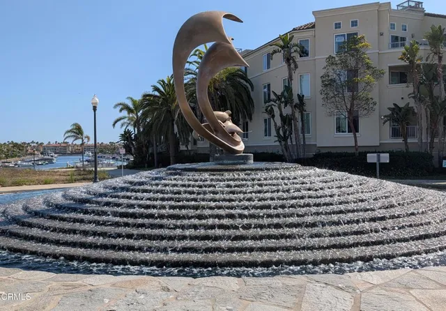 a view of living room with granite countertop furniture and fireplace