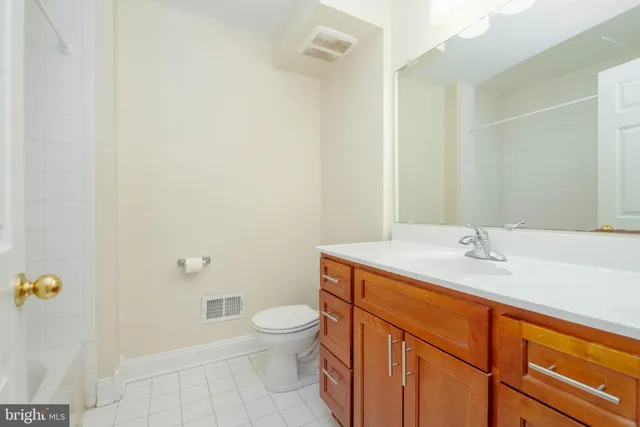 a bathroom with a sink and toilet